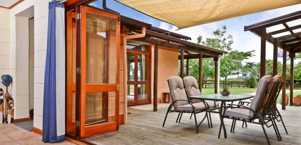Indoor - outdoor flow was very important for Kristina's client. Cool in summer and warm in winter.